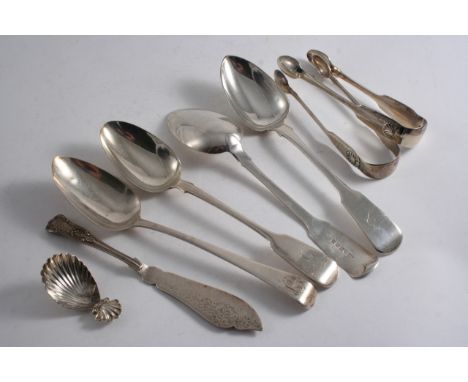 A MIXED LOT: Four various antique table spoons, all initialled, a George III caddy spoon with a scallop shell handle, initial