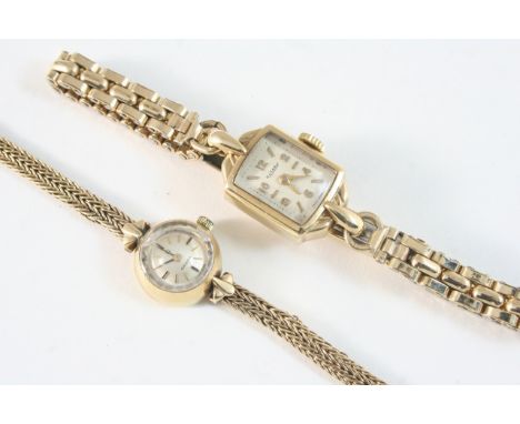 A LADY'S 9CT. GOLD WRISTWATCH BY OMEGA the signed circular dial with baton numerals, on a gold bracelet with ladder clasp, to