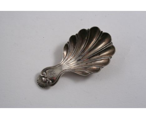 A VICTORIAN CADDY SPOON with a fluted bowl & a shell terminal, initialled, by Joseph Wilmore, Birmingham 1840;  3.1"  (8 cms)