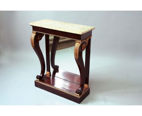 A GEORGE IV ROSEWOOD CONSOLE TABLE with a grey veined white marble top, a mirrored back and parcel gilt mouldings, 36ins. (91