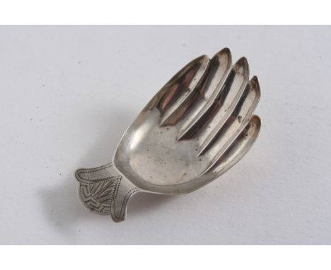 A GEORGE III CADDY SPOON in the form of a right hand with an engraved wrist or cuff, by Joseph Taylor, Birmingham 1806;  2.5"