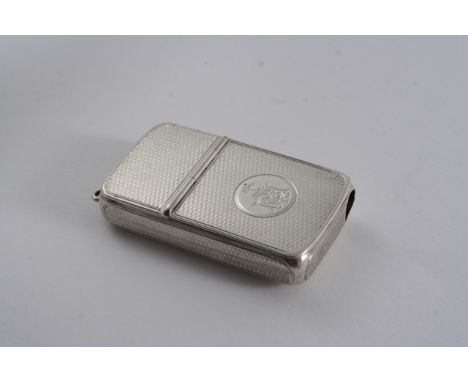 A VICTORIAN COMBINED TAPER HOLDER & VESTA CASE of rounded oblong form, with engine-turned decoration, engraved crest & monogr