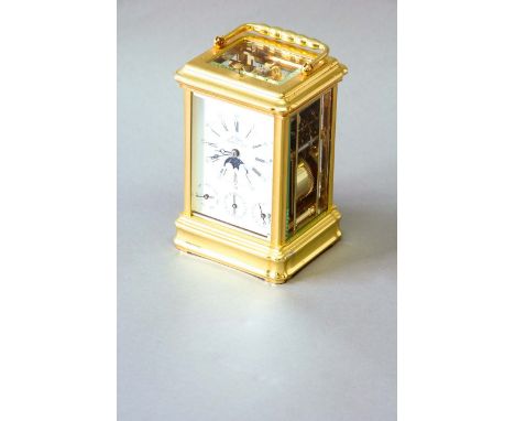 A CARRIAGE CLOCK dial white enamel, signed L ' Epee, subsidiary phases of the moon dial, day, hour and calendar rings, moveme