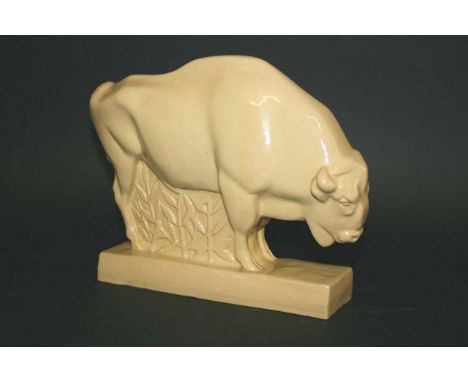 WEDGWOOD BISON - JOHN SKEAPING a model of a Bison with a coloured glaze, designed by John Skeaping. With it's wooden base. Im