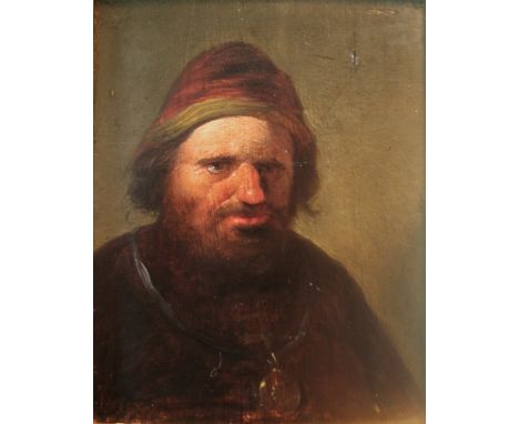 FOLLOWER OF ADRIAEN VAN OSTADE (1610-1685) MAN IN A CLOAK AND HAT Oil on panel 12.5 x 10cm. ++ Some old chipped losses; needs