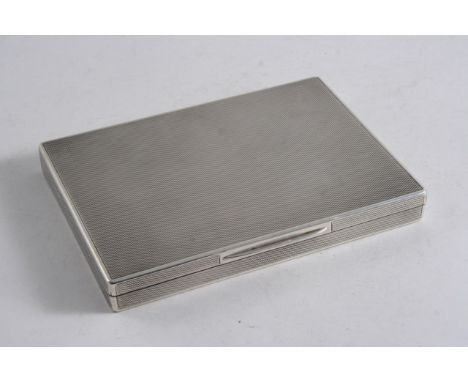 A MODERN OBLONG BOX with engine-turned decoration, the gilt interior with central divider (to take two packs of cards), the c