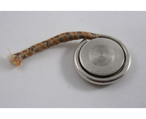 A VICTORIAN CIRCULAR VESTA CASE & SLOW MATCH HOLDER (COMBINED) of circular form with an engine-turned cover & base & a rotati