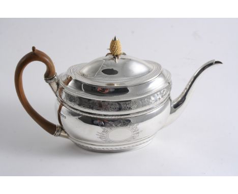 A MODERN ENGRAVED OVAL TEA POT in the George III style with two vacant trophy of arms cartouches and a carved ivory, pineappl