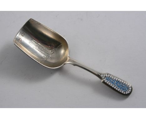A RUSSIAN SILVERGILT & CLOISONNE ENAMEL CADDY SCOOP decorated in turquoise, with a border of white pellets, monogrammed, with