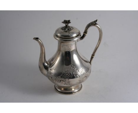 A LATE 19TH CENTURY CONTINENTAL SMALL BALUSTER COFFEE POT with chased floral decoration, two vacant cartouches & a flower fin
