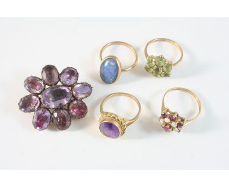 A QUANTITY OF JEWELLERY including a Georgian foil backed amethyst brooch, a garnet and opal cluster ring, set in gold, size M