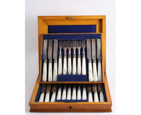 A VICTORIAN CASED SET OF TWELVE PAIRS OF MOTHER OF PEARL HANDLED DESSERT KNIVES & FORKS by R. Martin & E. Hall, Sheffield 186