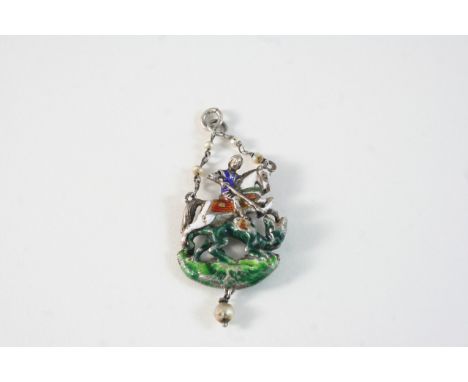 AN AUSTRO-HUNGARIAN ENAMEL PENDANT depicting St. George and the Dragon, 4cm.