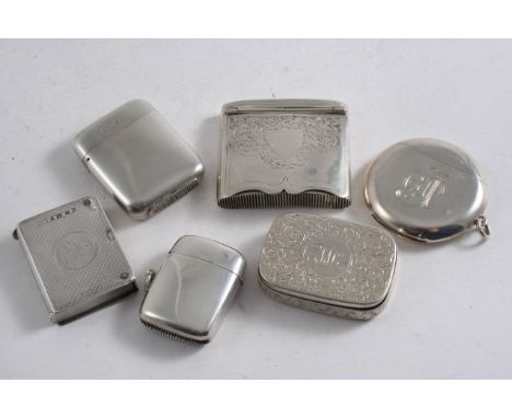 A MIXED LOT OF VESTA CASES: An Edwardian circular vesta, monogrammed, suspensory ring, Birmingham 1904, a plain rounded oblon