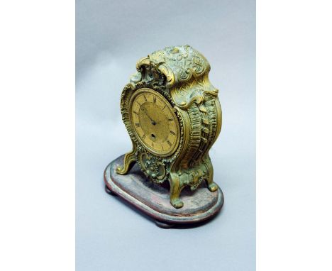 AN ORMOLU NEO ROCOCO TIMEPIECE dial engine turned, movement drum, signed Johnson, 50 Strand, case cast with scrolls and fabri