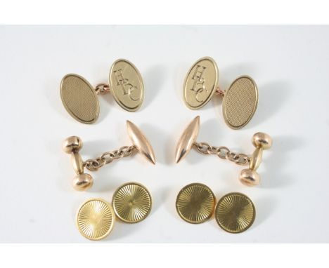 A PAIR OF 9CT. GOLD CUFFLINKS of oval-shape, engraved with initials and with engine-turned decoration, 8.8 grams, together wi
