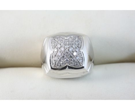 A DIAMOND AND 18CT. WHITE GOLD RING BY BVLGARI set with graduated circular-cut diamonds, signed to the inner shank. Size K 1/