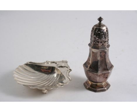 A GEORGE III BUTTER SHELL with a shaped gadrooned border, engraved with two crests, probably by Ann Farren, London 1770 and a