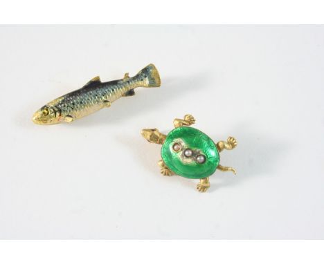 FISHING INTEREST: an enamel and gold salmon brooch, 4cm. long, together with a enamel and gold tortoise brooch, 3cm. wide.
