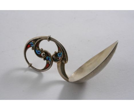 AN EARLY 20TH CENTURY NORWEGIAN SILVERGILT CADDY SPOON the curly scrol handle with plique-a-jour enamelled decoration, by J. 