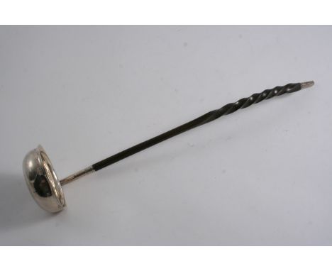 A GEORGE III SCOTTISH PROVINCIAL PUNCH LADLE with a shallow circular bowl & a twisted whalebone handle, maker's mark only, "I