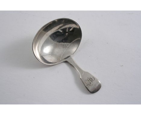 A GEORGE IV IRISH FIDDLE CADDY SPOON initialled, maker's mark "IB", possibly by J. Buckton, Dublin 1825;  3"  (7.5 cms) long;