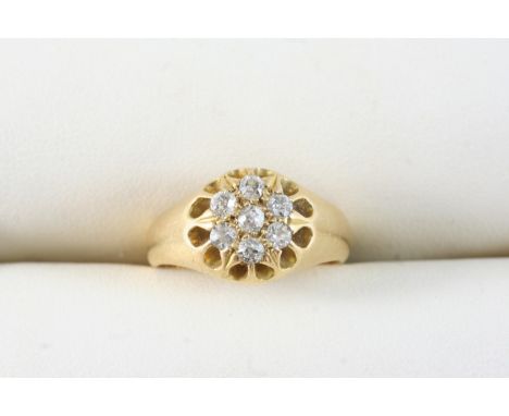 A DIAMOND CLUSTER RING set with circular-cut diamonds, in 18ct. gold. Size K.