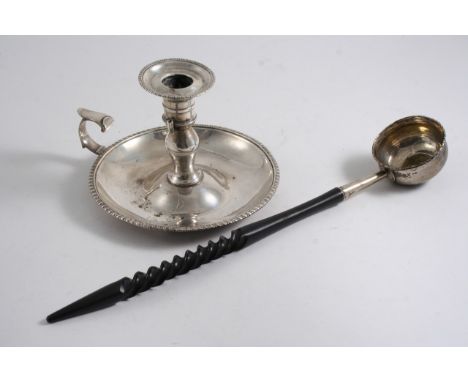 A MIXED LOT: A George III chamberstick, crested, with detachable nozzle (lacing conical snuffer) by William Frisbee, London 1