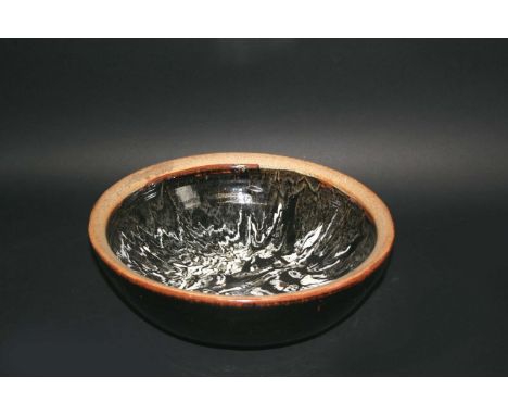 STUDIO POTTERY BOWL possibly by David Leach, a large stoneware bowl with a Tenmoku glaze to the exterior and a marble effect 