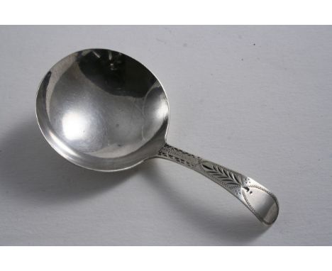 A GEORGE III CADDY SPOON with a bright-cut stem, plain round bowl  vacant cartouche, by Richard Ferris, Exeter c.1800 (no dat