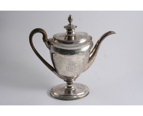 A GEORGE III VASE-SHAPED COFFEE POT with engraved borders, an oval pedestal foot & a spool-shaped cover with a bud finial, in