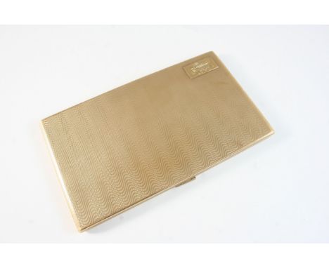 A 9CT. GOLD CIGARETTE CASE of rectangular-shape, with engine turned decoration and engraved with the letter M, inscribed to t
