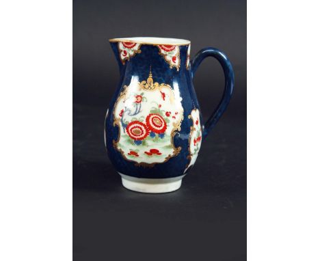 A FIRST PERIOD WORCESTER CREAM JUG painted in the kakiemon palette with flowering plants within gilt mirror cartouches on a b