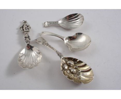 A GEORGE III CADDY SPOON with a bright-cut stem, initialled, by T. Northcote, London 1792 with two other George III caddy spo