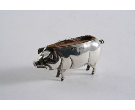AN EDWARDIAN NOVELTY PIN CUSHION in the form of a standing pig (lacking stuffing) by Adie & Lovekin Ltd., Birmingham 1906;  2