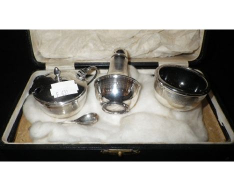 A SILVER CRUET SET with engine-turned decoration