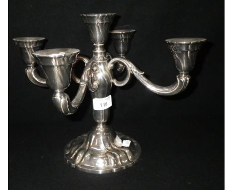 A GERMAN SILVER FIVE LIGHT CANDELABRUM with four scrolling arms, 9.75" high
