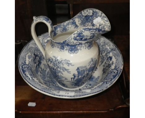 AN EARLY 19TH CENTURY BLUE AND WHITE WASH BASIN and a similar jug