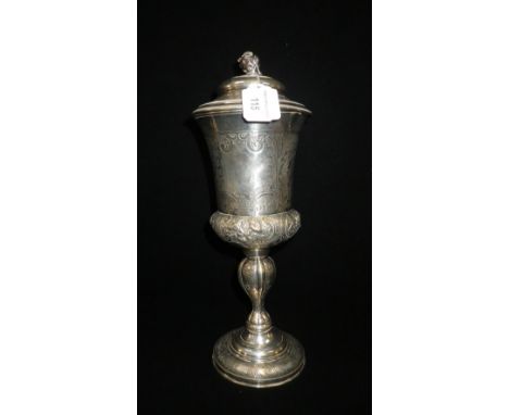 A CONTINENTAL SILVER CUP AND COVER of campana form, the domed pull-off cover with leaf bud finial, base marked 'Hagen', 12.75