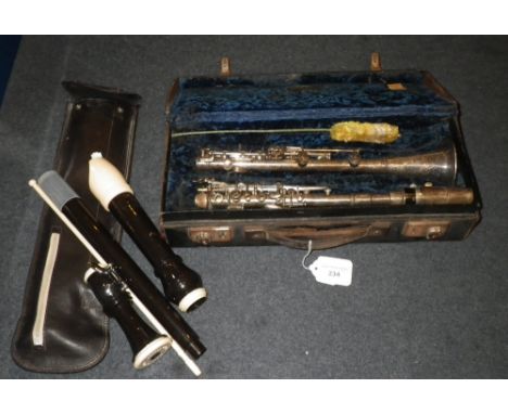 A VINTAGE BOOSEY & HAWKES SILVER PLATED CLARINET (boxed) and a bass recorder