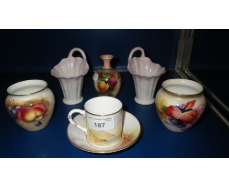 A PAIR OF ROYAL WORCESTER SQUAT VASES, each decorated with fruit (signed), a similar coffee can decorated with a grouse, a sm