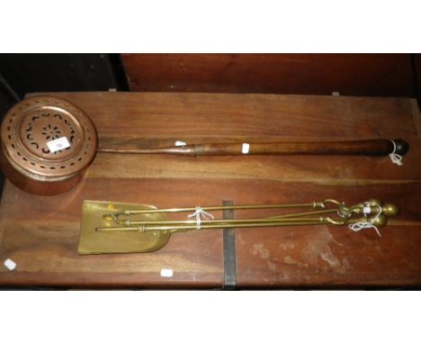 A DEEP COPPER CHESTNUT ROASTING PAN with pierced lid and a set of fire tools