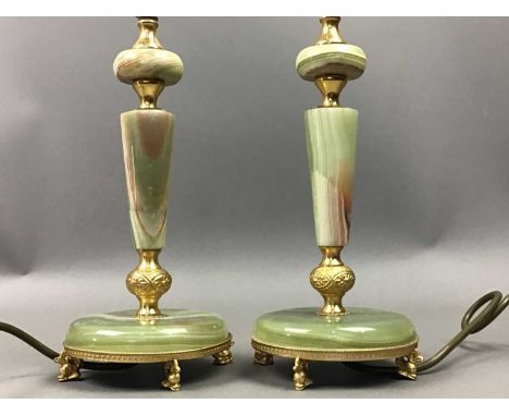 PAIR OF ONYX TABLE LAMP BASES,the tallest 32cm high, with gilt mount, along with a vintage magnifying glass on stand (3)