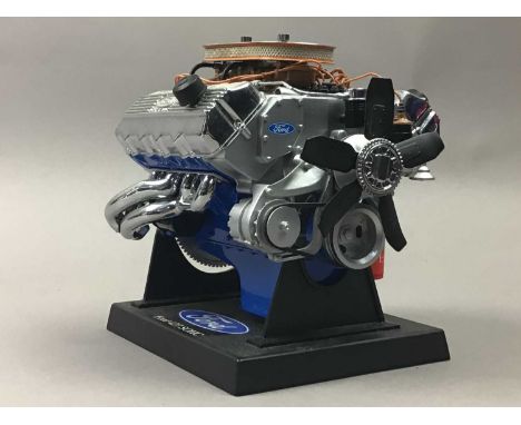 MODEL OF A FORD 427 ENGINE,along with three American car plates, including a Wisconsin example (4)