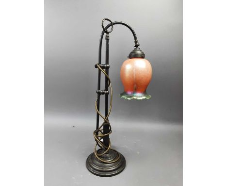 VINTAGE STYLE CAST METAL HEIGHT ADJUSTABLE TABLE LAMP,with an iridescent orange and green glass shade, 57cm high