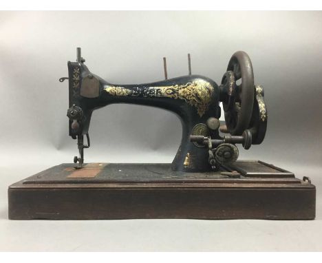 VINTAGE SINGER SEWING MACHINE,along with three other sewing machines 