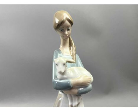TWO LLADRO FIGURES,the taller 27cm high, along with a lalique bird modelled jewellery stand and other glass ware including Mu