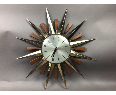 METAMIC SUNBURST WALL CLOCK,along with a Mickey Mouse alarm clock, a Smiths mantle clock and another (4)