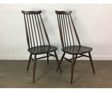 SET OF FOUR ERCOL GOLDSMITHS CHAIRS,98cm highJoints are all solid,&nbsp; extensive wear to back rail and spindles.signs of we