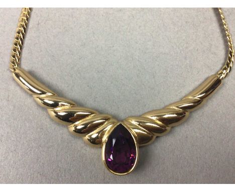 GEM SET NECKLET AND EARRINGS BY CHRISTIAN DIORIn Generally worn condition, minor dent to the clasp area. Unfortunately there 